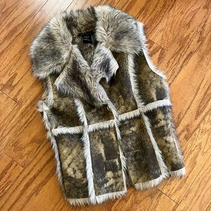 Fur vest, reversible. Like-New condition.